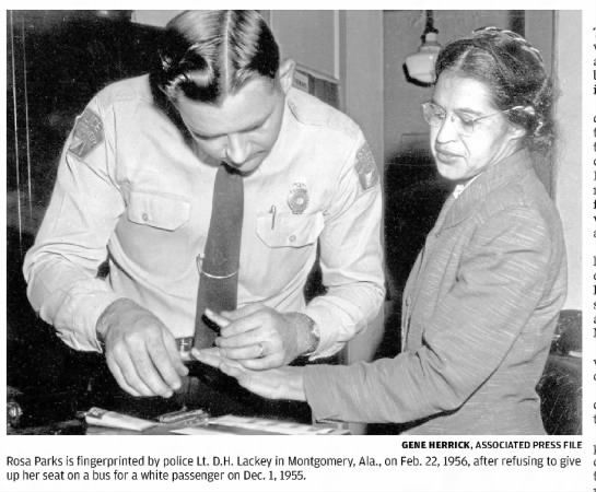 Ros Parks is fingerprinted by police